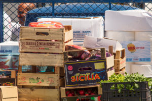 Sicily - Sunny impressions of the Aeolian Islands, also known as Aeolian Islands or Isole Eolie: Lipari, Stromboli, Salina, Vulcano, Panarea, Filicudi and Alicudi. Vegetable crates stacked on the back of an ape. Sicily - Sunny impressions of the Aeolian Islands, also known as Aeolian Islands or Isole Eolie: Lipari, Stromboli, Salina, Vulcano, Panarea, Filicudi and Alicudi. Vegetable crates stacked on the back of an ape.